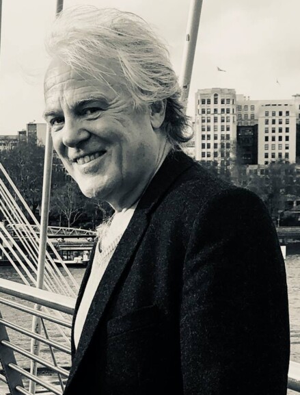 Author head and shoulders on Hungerford Bridge, London